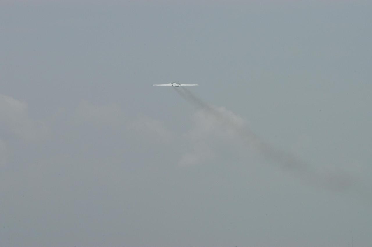KENNEDY SPACE CENTER, FLA. -  Over Patrick Air Force Base in Cocoa Beach, Fla., the WB-57F aircraft is airborne for a test flight.  The aircraft will take photos of Space Shuttle Discovery during its launch on Return to Flight mission STS-114.  NASA approved the development and implementation of the aircraft-based imaging system, known as the WB-57 Ascent Video Experiment (WAVE).  The WAVE provides both ascent and entry imagery and enables better observation of the Shuttle on days of heavier cloud cover and areas obscured from ground cameras by the launch exhaust plume. WAVE comprises a 32-inch-ball turret system mounted on the nose of two WB-57 aircraft. The turret houses an optical bench, providing installation of both HDTV and infrared cameras. Optics consist of an 11-inch-diameter, 4.2 meter fixed-focal-length lens. The system can be operated in both auto track and manual modes.