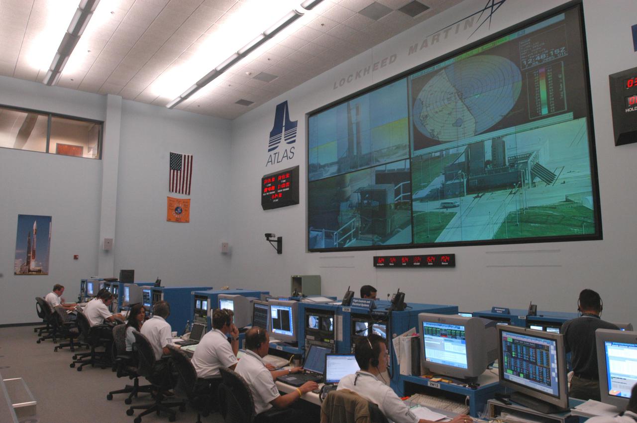KENNEDY SPACE CENTER, FLA. -   At the Atlas V Spaceflight Operations Center, the launch team goes through a wet dress rehearsal for launch of the Mars Reconnaissance Orbiter (MRO), scheduled for Aug. 10.  Launch of the MRO aboard an Atlas V rocket will be from Launch Complex 41 at Cape Canaveral Air Force Station in Florida.  A wet rehearsal includes pre-liftoff operations and a fueling of the rocket’s engine. The MRO was built by Lockheed Martin for NASA Jet Propulsion Laboratory in California.  It is the next major step in Mars exploration and scheduled for launch from Cape Canaveral Air Force Station. The MRO is an important next step in fulfilling NASA’s vision of space exploration and ultimately sending human explorers to Mars and beyond.