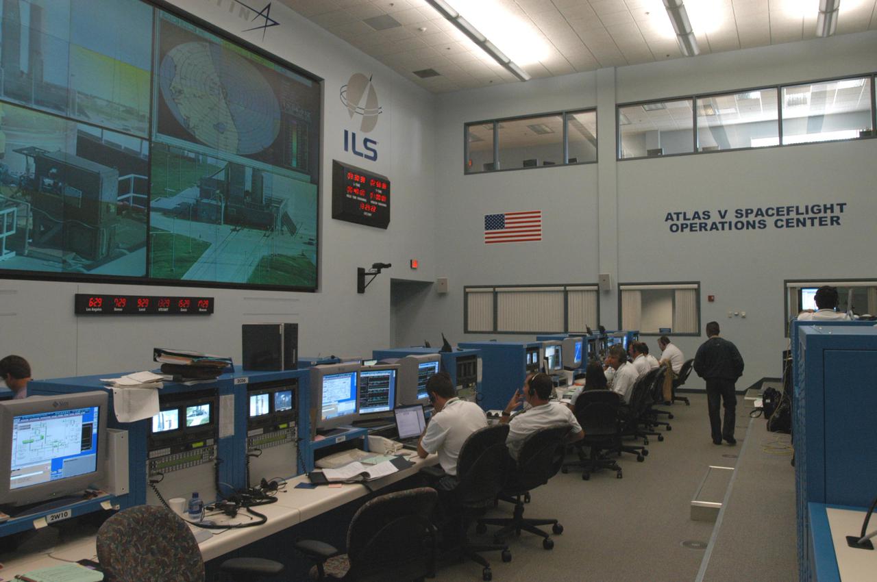 KENNEDY SPACE CENTER, FLA. -   At the Atlas V Spaceflight Operations Center, the launch team goes through a wet dress rehearsal for launch of the Mars Reconnaissance Orbiter (MRO), scheduled for Aug. 10.  Launch of the MRO aboard an Atlas V rocket will be from Launch Complex 41 at Cape Canaveral Air Force Station in Florida.  A wet rehearsal includes pre-liftoff operations and a fueling of the rocket’s engine. The MRO was built by Lockheed Martin for NASA Jet Propulsion Laboratory in California.  It is the next major step in Mars exploration and scheduled for launch from Cape Canaveral Air Force Station. The MRO is an important next step in fulfilling NASA’s vision of space exploration and ultimately sending human explorers to Mars and beyond.