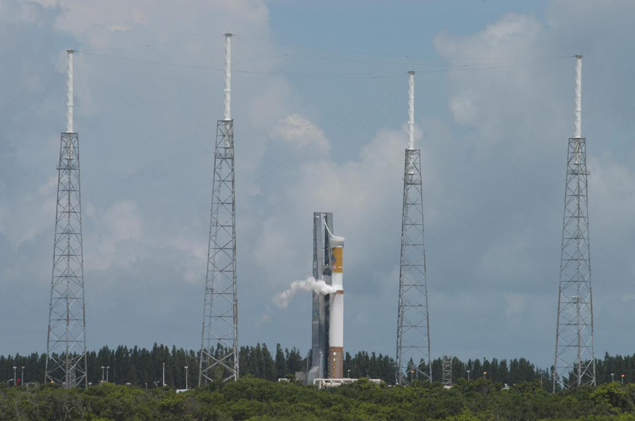 KENNEDY SPACE CENTER, FLA. - At Launch Complex 41 on Cape Canaveral Air Force Station in Florida, the Atlas V rocket is fueled as part of a wet dress rehearsal for launch of the Mars Reconnaissance Orbiter (MRO), scheduled for Aug. 10. Launch of the MRO aboard an Atlas V rocket will be from Launch Complex 41 at Cape Canaveral Air Force Station in Florida. A wet rehearsal includes pre-liftoff operations and fueling of the rocket’s engine. The MRO was built by Lockheed Martin for NASA Jet Propulsion Laboratory in California. It is the next major step in Mars exploration and scheduled for launch from Cape Canaveral Air Force Station. The MRO is an important next step in fulfilling NASA’s vision of space exploration and ultimately sending human explorers to Mars and beyond.