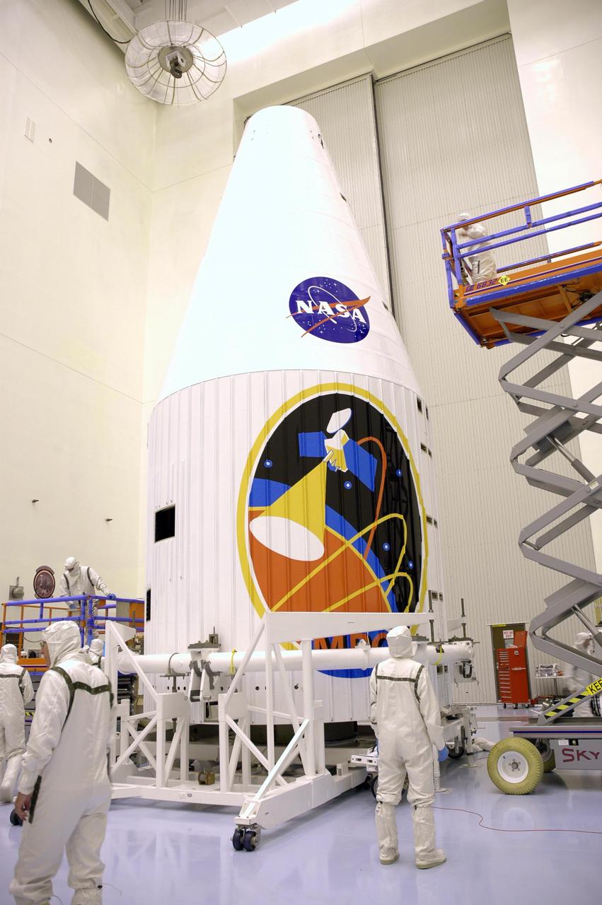 KENNEDY SPACE CENTER, FLA. - In the Payload Hazardous Servicing Facility, the Mars Reconnaissance Orbiter is encapsulated and ready to be moved to the launch pad. The fairing protects the spacecraft during launch and flight through the atmosphere. Once in space, it is jettisoned. Launch of the MRO aboard an Atlas V rocket will be from Launch Complex 41 at Cape Canaveral Air Force Station in Florida. The MRO is the next major step in Mars exploration and scheduled for launch from Cape Canaveral Air Force Station in a window opening Aug. 10. The MRO is an important next step in fulfilling NASA’s vision of space exploration and ultimately sending human explorers to Mars and beyond.
