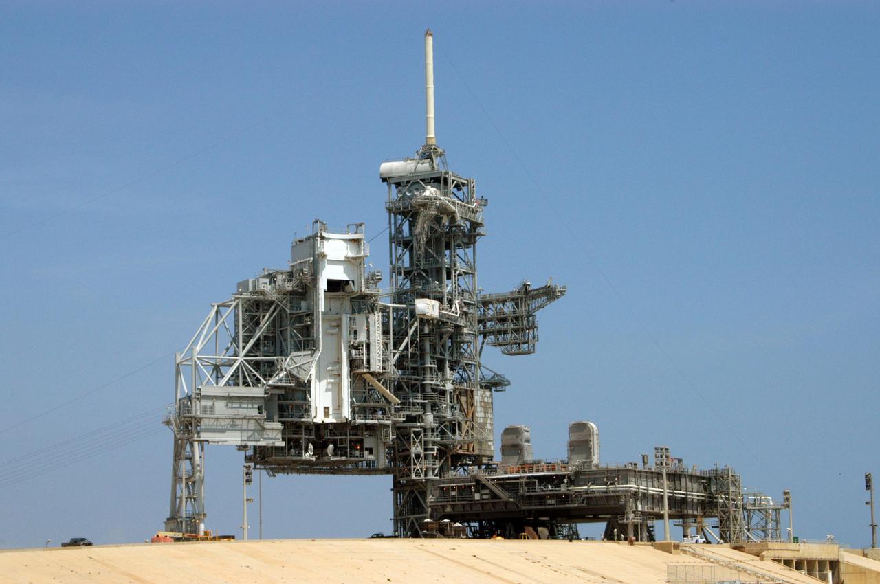 KENNEDY SPACE CENTER, FLA. - Launch Pad 39B at NASA Kennedy Space Center is clear after launch of Space Shuttle Discovery on Return to Flight mission STS-114.  The Mobile Launcher Platform is still in place but will be moved to prepare for Space Shuttle Atlantis, the designated vehicle for mission STS-121 to the International Space Station.  Launch of STS-121 is during a window extending from Sept. 9 to Sept. 25.