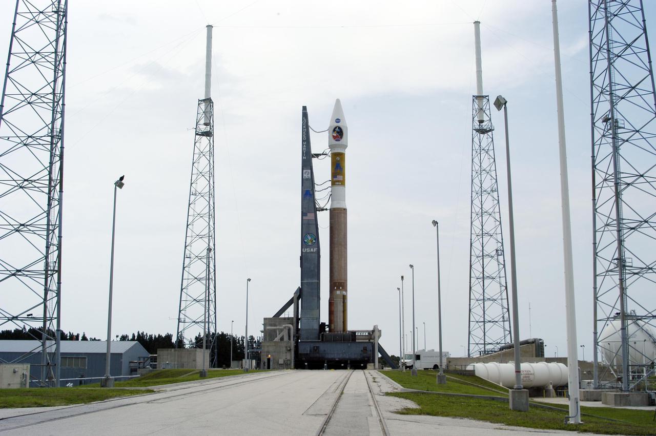 KENNEDY SPACE CENTER, FLA. - NASA's Mars Reconnaissance Orbiter (MRO), atop a Lockheed Martin Atlas V rocket, awaits launch at Launch Complex 41 at Cape Canaveral Air Force Station in Florida. The launch was delayed 24 hours to investigate an anomalous reading in the hydrogen propellant loading system on the Atlas V. At the conclusion of the inquiry, the Atlas V was cleared to launch on Aug. 12 between 7:43 and 9:43 a.m. EDT. The spacecraft will arrive at Mars in March 2006. Once in orbit around Mars, various instruments on the MRO will convey detailed observations of the Martian surface, subsurface and atmosphere. Researchers will use the data to study the history and distribution of Martian water. Learning more about what has happened to the water will focus searches for possible past or present Martian life. Observations by the orbiter will also support future Mars missions by examining potential landing sites and providing a communications relay between the Martian surface and Earth.