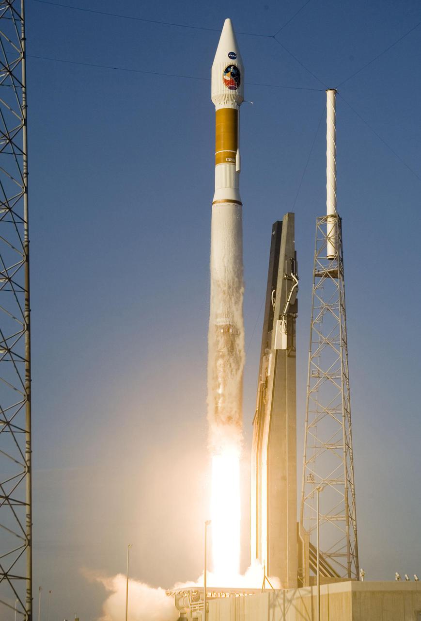 KENNEDY SPACE CENTER, FLA. -   Trailing smoke and fire, an Atlas V launch vehicle, 19 stories tall, with a two-ton Mars Reconnaissance Orbiter (MRO) on top, roars away from Launch Complex 41 at Cape Canaveral Air Force Station at 7:43 a.m. EDT. All systems performed nominally for NASA's first launch of an Atlas V on an interplanetary mission. MRO established radio contact with controllers 61 minutes after launch and within four minutes of separation from the upper stage. Initial contact came through an antenna at the Japan Aerospace Exploration Agency's Uchinoura Space Center in southern Japan.  Mars is 72 million miles from Earth today, but the spacecraft will travel more than four times that distance on its outbound-arc trajectory to intercept the red planet on March 10, 2006. The orbiter carries six scientific instruments for examining the surface, atmosphere and subsurface of Mars in unprecedented detail from low orbit.  NASA expects to get several times more data about Mars from MRO than from all previous Martian missions combined. Researchers will use the instruments to learn more about the history and distribution of Mars' water. That information will improve understanding of planetary climate change and will help guide the quest to answer whether Mars ever supported life. The orbiter will also evaluate potential landing sites for future missions. (Photo Credit: Tom Rogers)
