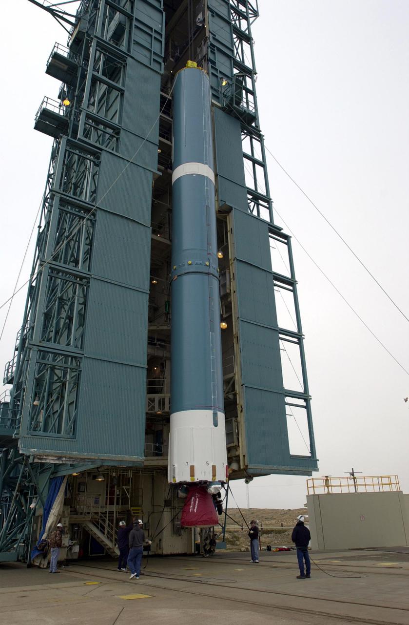 VANDENBERG AIR FORCE BASE, CALIF.  - At NASA Space Launch Complex 2 on Vandenberg Air Force Base in California, the Boeing Delta II rocket, launch vehicle for the CALIPSO_CloudSat spacecraft, is ready to lifted into the mobile service tower, or gantry. CALIPSO stands for Cloud-Aerosol Lidar and Infrared Pathfinder Satellite Observation.  CALIPSO and CloudSat are highly complementary satellites and together will provide never-before-seen 3-D perspectives of how clouds and aerosols form, evolve, and affect weather and climate. CALIPSO and CloudSat will fly in formation with three other satellites in the A-train constellation to enhance understanding of our climate system. Launch of CALIPSO_CloudSat aboard a Boeing Delta II rocket is scheduled for 3:01 a.m. Sept. 29.