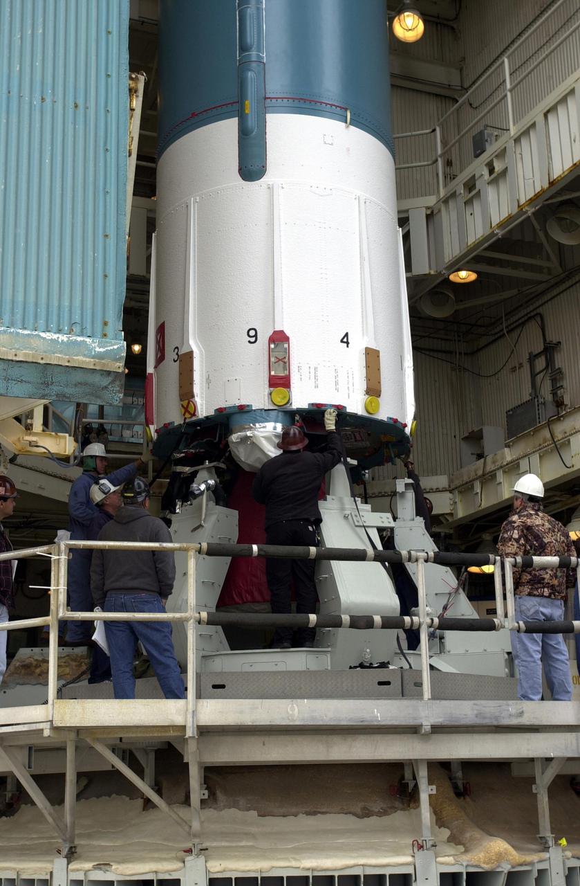 VANDENBERG AIR FORCE BASE, CALIF.  - At NASA Space Launch Complex 2 on Vandenberg Air Force Base in California, the Boeing Delta II rocket, launch vehicle for the CALIPSO_CloudSat spacecraft, is prepared for lifting into the mobile service tower, or gantry. CALIPSO stands for Cloud-Aerosol Lidar and Infrared Pathfinder Satellite Observation.  CALIPSO and CloudSat are highly complementary satellites and together will provide never-before-seen 3-D perspectives of how clouds and aerosols form, evolve, and affect weather and climate. CALIPSO and CloudSat will fly in formation with three other satellites in the A-train constellation to enhance understanding of our climate system. Launch of CALIPSO_CloudSat aboard a Boeing Delta II rocket is scheduled for 3:01 a.m. Sept. 29.