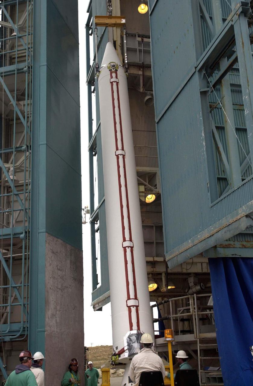VANDENBERG AIR FORCE BASE, CALIF.  - One of four Solid Rocket Boosters for the CALIPSO_CloudSat launch is ready for lifting into the mobile service tower, or gantry, where it will be attached to the Boeing Delta II rocket. CALIPSO stands for Cloud-Aerosol Lidar and Infrared Pathfinder Satellite Observation.  CALIPSO and CloudSat are highly complementary satellites and together will provide never-before-seen 3-D perspectives of how clouds and aerosols form, evolve, and affect weather and climate. CALIPSO and CloudSat will fly in formation with three other satellites in the A-train constellation to enhance understanding of our climate system. Launch of CALIPSO_CloudSat aboard a Boeing Delta II rocket is scheduled for 3:01 a.m. Sept. 29.