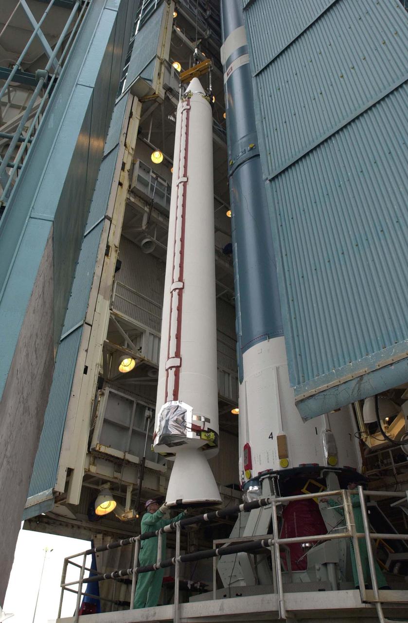 VANDENBERG AIR FORCE BASE, CALIF.   - Workers on NASA Space Launch Complex 2 at Vandenberg Air Force Base in California prepare the Solid Rocket Booster for lifting into the mobile service tower, or gantry, where it will be attached to the Boeing Delta II rocket.  The Delta is the launch vehicle for the CALIPSO_CloudSat spacecraft.  CALIPSO stands for Cloud-Aerosol Lidar and Infrared Pathfinder Satellite Observation.  CALIPSO and CloudSat are highly complementary satellites and together will provide never-before-seen 3-D perspectives of how clouds and aerosols form, evolve, and affect weather and climate. CALIPSO and CloudSat will fly in formation with three other satellites in the A-train constellation to enhance understanding of our climate system. Launch of CALIPSO_CloudSat aboard a Boeing Delta II rocket is scheduled for 3:01 a.m. Sept. 29.