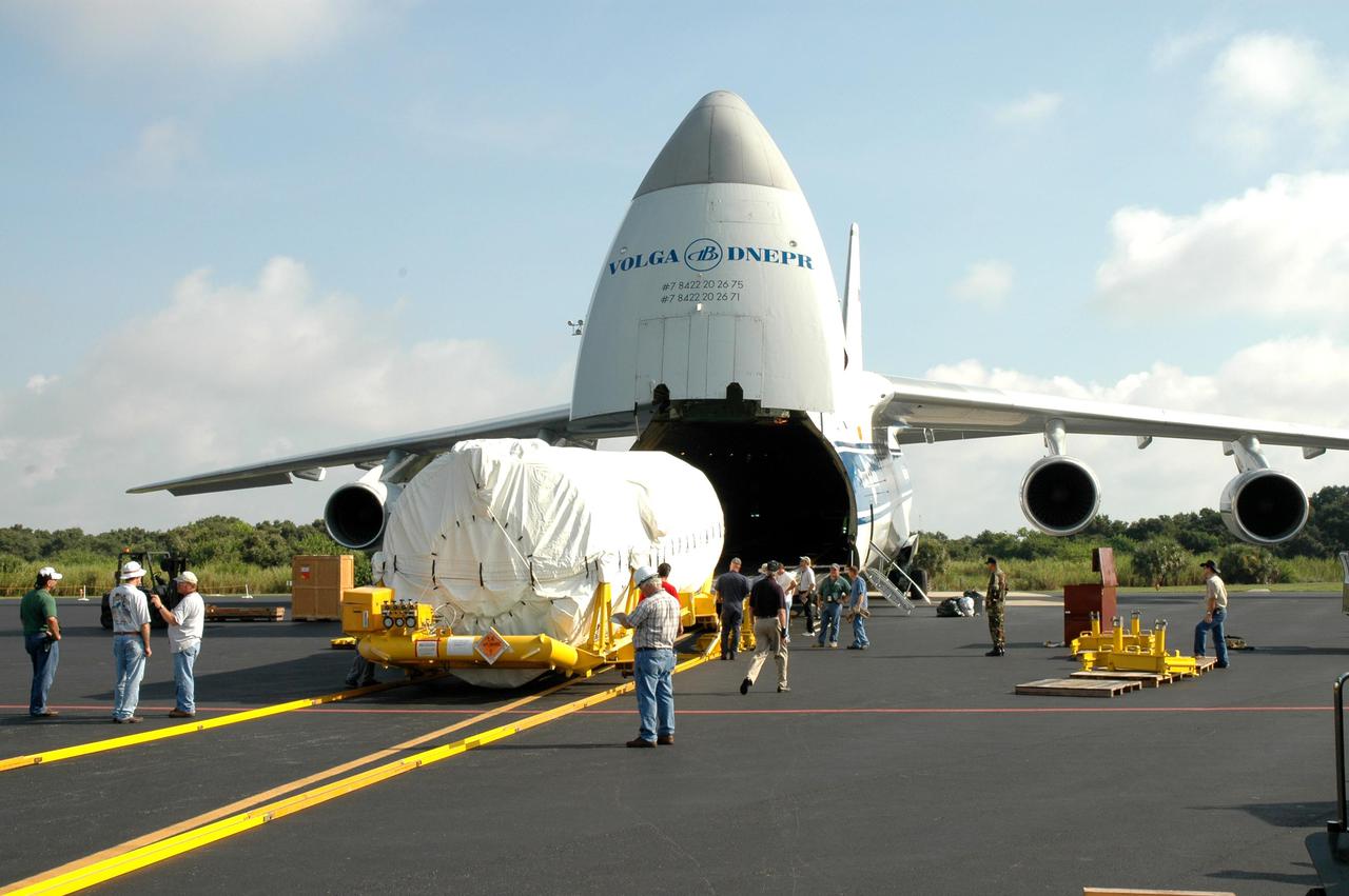 KENNEDY SPACE CENTER, FLA.  - At the Skid Strip on Cape Canaveral Air Force Station (CCAFS), the second stage Centaur has been offloaded from a Russian air cargo plane.  The Centaur is the upper stage of the Atlas V configuration that will launch the New Horizons spacecraft from Launch Complex 41 at CCAFS. New Horizons is designed to help us understand worlds at the edge of our solar system by making the first reconnaissance of Pluto and Charon - a 'double planet' and the last planet in our solar system to be visited by spacecraft. The mission will then visit one or more objects in the Kuiper Belt region beyond Neptune. New Horizons is scheduled to launch in January 2006, swing past Jupiter for a gravity boost and scientific studies in February or March 2007, and reach Pluto and its moon, Charon, in July 2015.