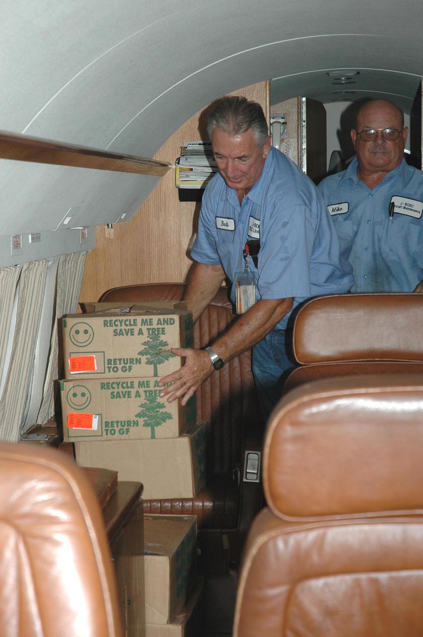 KENNEDY SPACE CENTER, FLA. -Workers at Kennedy Space Center place boxes of supplies in the airplane heading to Stennis Space Center in Mississippi for NASA workers there. Both Michoud Assembly Facility near New Orleans and Stennis were effected by Hurricane Katrina. KSC is sending a helicopter with medical supplies and an Emergency Medical Technician to Stennis. A NASA plane is carrying medical supplies, food and chain saws, as well as a physician and two high voltage technicians to Michoud to ensure the facility can safely receive power when the main electricity grid comes online. KSC has sent a truck with 1,000 gallons of diesel fuel and three large generators: a 1-megawatt generator, and 125- and 225-kilowatt generators. A 14-person security team is also going to Michoud to relieve the security professionals at that location.