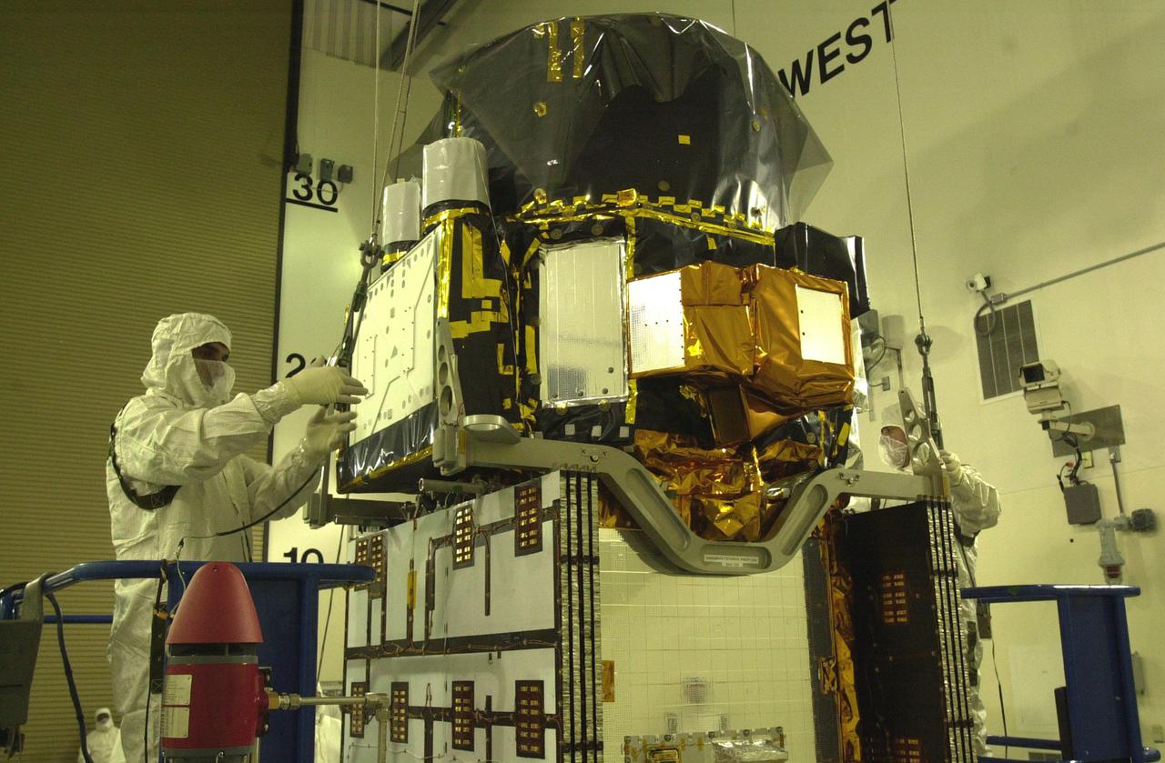 VANDENBERG AIR FORCE BASE, CALIF. - Inside the Astrotech Payload Processing Facility on Vandenberg Air Force Base in California, the CALIPSO spacecraft is prepared for weighing. CALIPSO stands for Cloud-Aerosol Lidar and Infrared Pathfinder Satellite Observation. It will fly in combination with the CloudSat satellite to provide never-before-seen 3-D perspectives of how clouds and aerosols form, evolve, and affect weather and climate. CALIPSO and CloudSat will join three other satellites in orbit to enhance understanding of climate systems. The two satellites will launch aboard a Boeing Delta II rocket no earlier than Oct. 1 from Space Launch Complex 2 at Vandenberg.