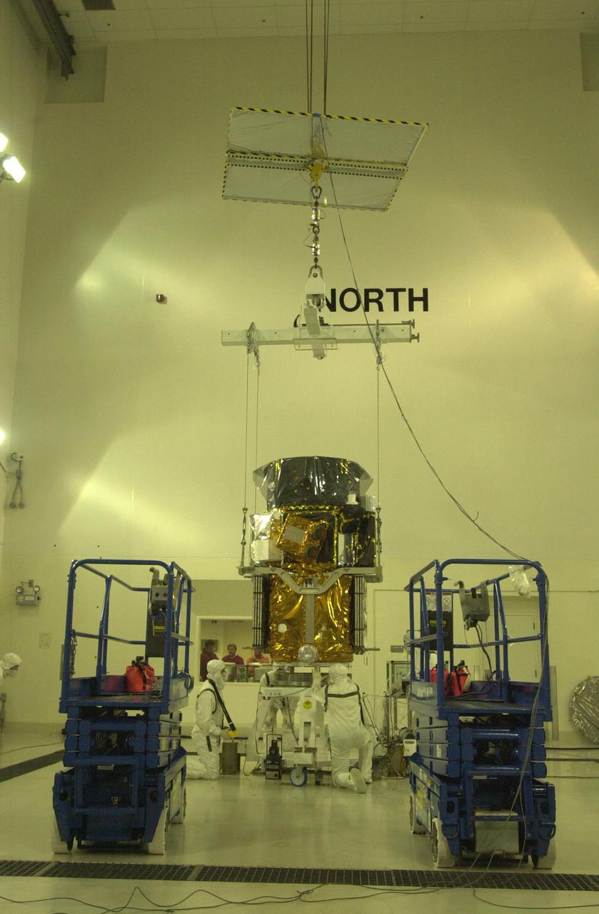 VANDENBERG AIR FORCE BASE, CALIF. - Inside the Astrotech Payload Processing Facility on Vandenberg Air Force Base in California, the CALIPSO spacecraft is weighed. CALIPSO stands for Cloud-Aerosol Lidar and Infrared Pathfinder Satellite Observation. It will fly in combination with the CloudSat satellite to provide never-before-seen 3-D perspectives of how clouds and aerosols form, evolve, and affect weather and climate. CALIPSO and CloudSat will join three other satellites in orbit to enhance understanding of climate systems. The two satellites will launch aboard a Boeing Delta II rocket no earlier than Oct. 1 from Space Launch Complex 2 at Vandenberg.