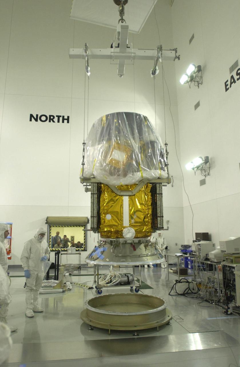 VANDENBERG AIR FORCE BASE, CALIF.  - Inside the Astrotech Payload Processing Facility on Vandenberg Air Force Base in California, the CALIPSO spacecraft is lifted for its move to the Lower Delta Payload Attach Fitting (LDPAF).  CALIPSO will be mated with the LDPAF, which contains the CloudSat satellite. The PAF is the interface between the spacecraft and the second stage of the rocket.  CALIPSO stands for Cloud-Aerosol Lidar and Infrared Pathfinder Satellite Observation. CALIPSO and CloudSat are highly complementary satellites that will provide never-before-seen 3-D perspectives of how clouds and aerosols form, evolve, and affect weather and climate. CALIPSO and CloudSat will fly in formation with three other satellites in the A-train constellation to enhance understanding of our climate system. Launch of CALIPSO_CloudSat aboard a Boeing Delta II rocket is scheduled for 3:01 a.m. PDT Sept. 29.