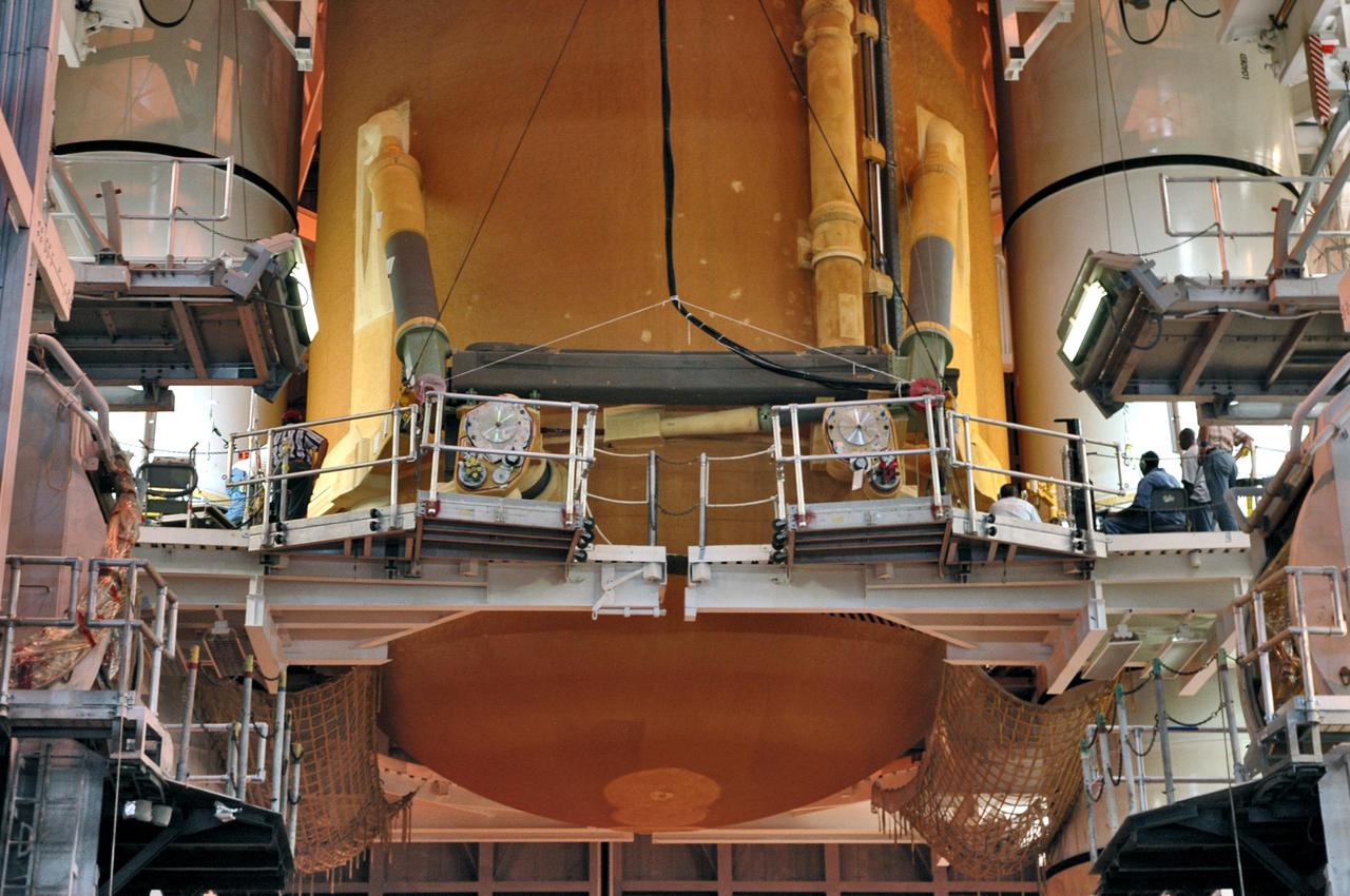 KENNEDY SPACE CENTER, FLA. - In NASA Kennedy Space Center’s Vehicle Assembly Building, an external tank is demated from the solid rocket boosters originally scheduled to fly on mission STS-121 with Space Shuttle Atlantis. It will temporarily be stored in a checkout cell in the VAB and await assignment to a future mission.