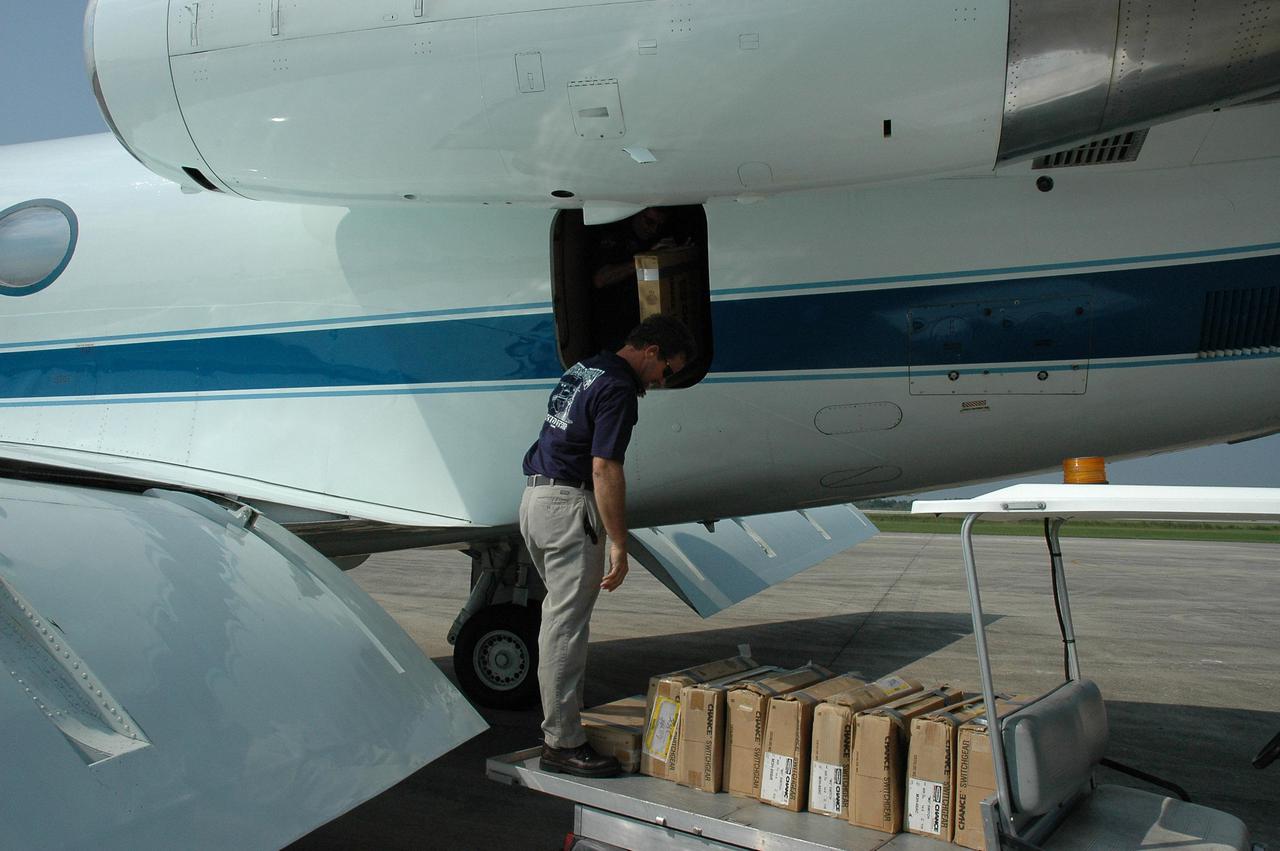 KENNEDY SPACE CENTER, FLA. - At the NASA Kennedy Space Center Shuttle Landing Facility, hurricane relief supplies are being loaded onto a NASA aircraft bound for Stennis Space Center in Mississippi, which suffered damage from Hurricane Katrina. The supplies included 10 boxes of load bus disconnects going to Michoud Assesmbly Facility near New Orleans and 17 boxes of personal hygiene items, along with boxes of clothing and water.  Many Stennis and Michoud employees were rendered homeless by the hurricane.  NASA centers have been generous with relief supplies and personnel.  Stennis is in limited operations mode.  Daily convoys have been moving between Stennis and Michould, transporting personnel and supplies as Michoud prepares to resume limited operations.