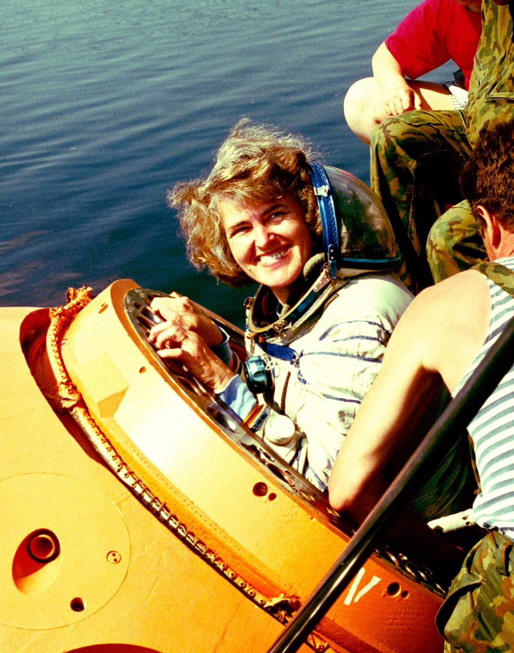 Astronaut Shannon Lucid is seen egressing from a training version of a soyez spacecraft, during a water survival training session in Russia. In March of 1996, Lucid accompanied the STS-76 crew to the Russian space station, Mir, where she stayed for a little over four months before returning to Earth with the STS-79 crew.          