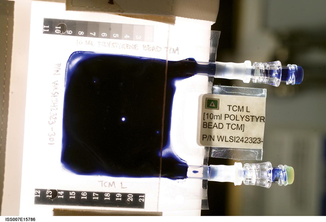 Aboard the International Space Station (ISS), the Tissue Culture Medium (TCM) is the bioreactor vessel in which cell cultures are grown.  With its two syringe ports, it is much like a bag used to administer intravenous fluid, except it allows gas exchange needed for life.  The TCM contains cell culture medium, and when frozen cells are flown to the ISS, they are thawed and introduced to the TCM through the syringe ports.  In the Cellular Biotechnology Operations Support System-Fluid Dynamics Investigation (CBOSS-FDI) experiment, several mixing procedures are being assessed to determine which method achieves the most uniform mixing of growing cells and culture medium.