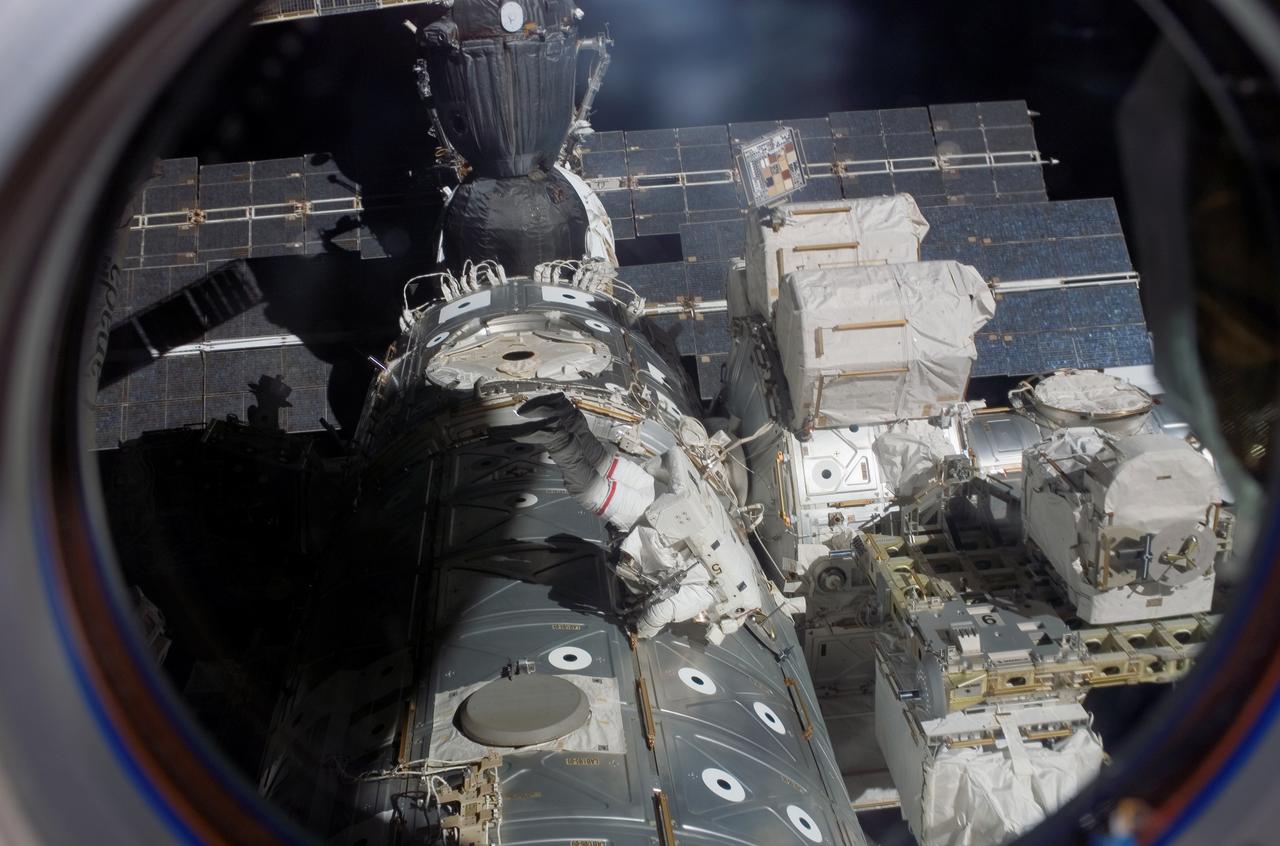 As the construction continued on the International Space Station (ISS), STS-118 astronaut and mission specialist Rick Mastracchio participated in the second session of Extra Vehicular Activity (EVA) for the mission. Assisting Mastracchio was Canadian Space Agency representative Dave Williams (out of frame). During the 6 hour, 28 minute space walk, the two removed a faulty control moment gyroscope (CMG-3) and installed a new CMG into the Z1 truss.  The failed CMG will remain in its temporary stowage location on the exterior of the station until it is returned to Earth on a later Shuttle mission. The new gyroscope is one of four CMGs that are used to control the orbital attitude of the station.
