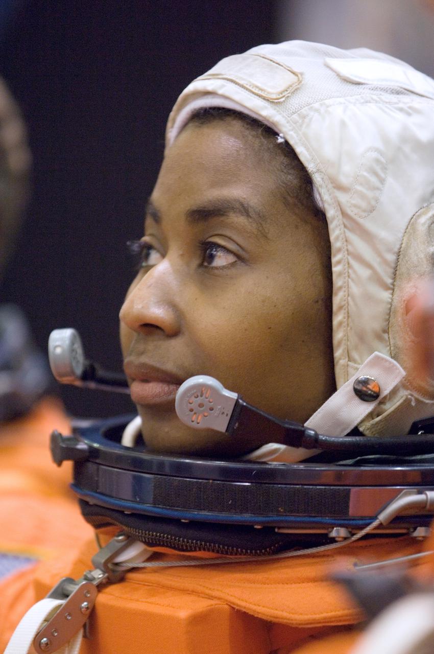 Attired in a training version of her shuttle launch and entry suit, astronaut Stephanie D. Wilson, STS-120 mission specialist, awaits the start of a training session in the Space Vehicle Mockup Facility at Johnson Space Center. Wilson was preparing for her launch aboard Space Shuttle Discovery which occurred on October 23, 2007.