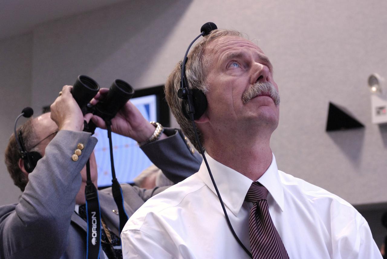 NASA Associate Administrator for Space Operations, Bill Gerstenmaier (foreground) watches the launch of the Space Shuttle Endeavour (STS-118) from the Launch Control Center Wednesday, August 8, 2007, at the Kennedy Space Center in Cape Canaveral, Fla. The Shuttle lifted off from launch pad 39A at 6:36p.m. EDT. Photo Credit: "NASA/Bill Ingalls"