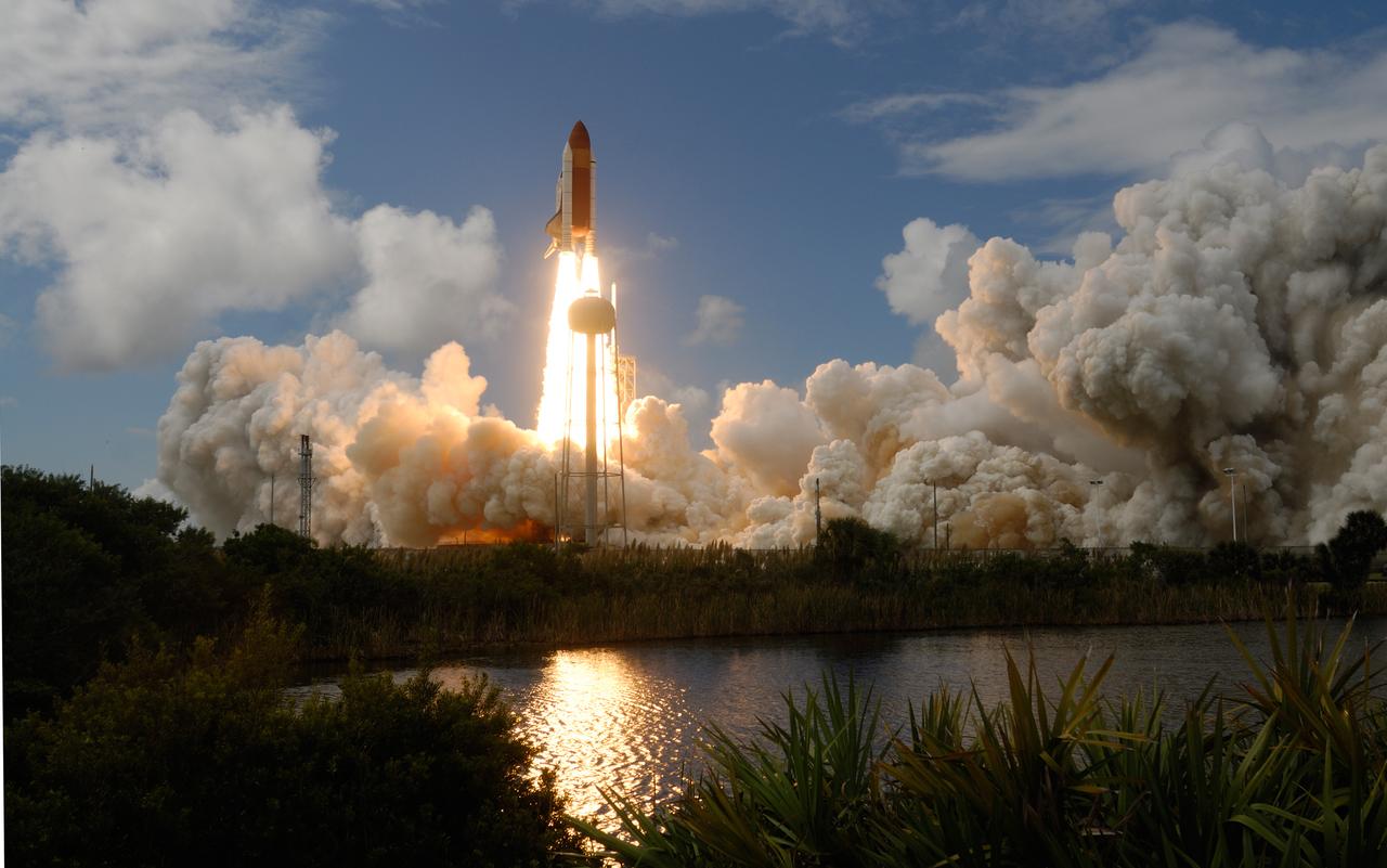 (10/23/2007) --- KENNEDY SPACE CENTER, FLA. -- Out of the clouds of smoke and steam rolling across Launch Pad 39A at NASA's Kennedy Space Center, space shuttle Discovery hurtles toward space on the 23rd assembly mission to the International Space Station. Liftoff was on time at 11:38:19 a.m. EDT. Discovery carries the Italian-built U.S. Node 2, called Harmony. During the 14-day STS-120 mission, the crew will install Harmony and move the P6 solar arrays to their permanent position and deploy them. Discovery is expected to complete its mission and return home at 4:47 a.m. EST on Nov. 6