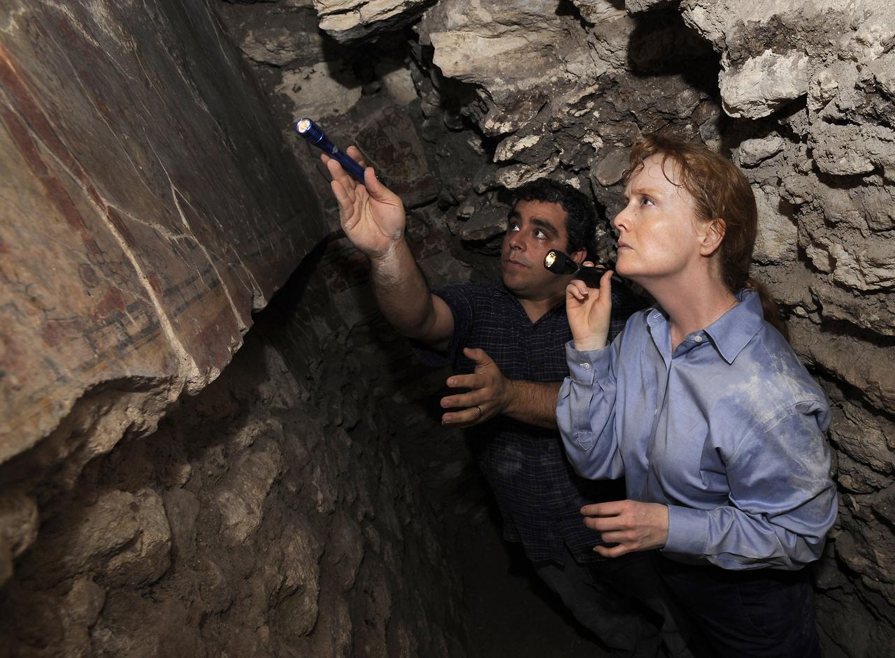 NASA's Deputy Administrator Shana Dale and NASA Research Scientist Dr. William Saturno investigate the San Bartolo Maya archaeological site in Peten, Guatemala, Tuesday Dec. 11, 2007. NASA's remote sensing data were used to locate and interpret the remains of the ancient Maya civilization.  Photo Credit: (NASA/Bill Ingalls)