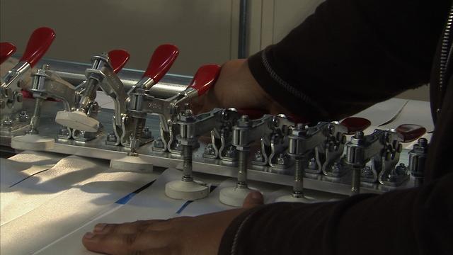 Shown is the fabrication of the First Stage Main Parachute in support of Ares/CLV at the Pioneer Zodiac Facility in Mississippi in support of the Constellation/Ares project. This image is extracted from a high definition video file and is the highest resolution available