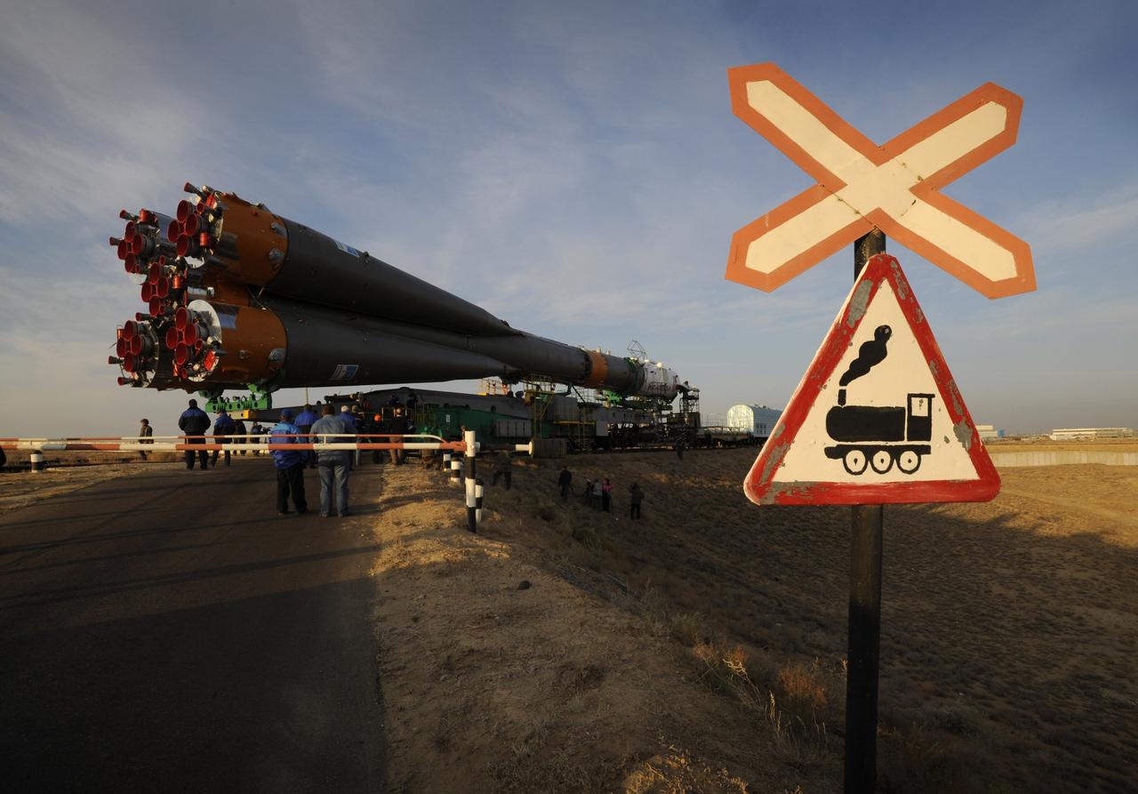 The Soyuz TMA-13 spacecraft is transported by railcar to its launch pad at the Baikonur Cosmodrome in Kazakhstan, Friday, Oct. 10, 2008 for launch Oct. 12 to carry Expedition 18 Commander Michael Fincke, Flight Engineer Yury V. Lonchakov and American Spaceflight Participant Richard Garriott to the International Space Station. The three crew members will dock their Soyuz to the International Space Station on Oct. 14. Fincke and Lonchakov will spend six months on the station, while Garriott will return to Earth Oct. 24, 2008 with two of the Expedition 17 crewmembers currently on the International Space Station.  Photo Credit: (NASA/Bill Ingalls)