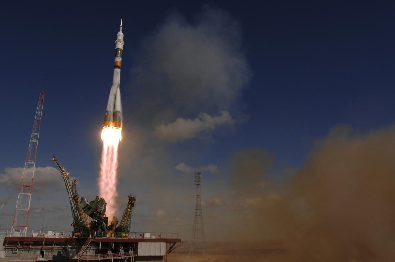 The Soyuz TMA-13 spacecraft, carrying Expedition 18 Commander Michael Fincke, Flight Engineer Yury V. Lonchakov and American Spaceflight Participant Richard Garriott, launches, Sunday, Oct. 12, 2008, from the Baikonur Cosmodrome in Kazakhstan. The three crew members are scheduled to dock with the International Space Station on Oct. 14. Fincke and Lonchakov will spend six months on the station, while Garriott will return to Earth Oct. 24, 2008 with two of the Expedition 17 crewmembers currently on the International Space Station. Photo Credit: (NASA/Bill Ingalls)
