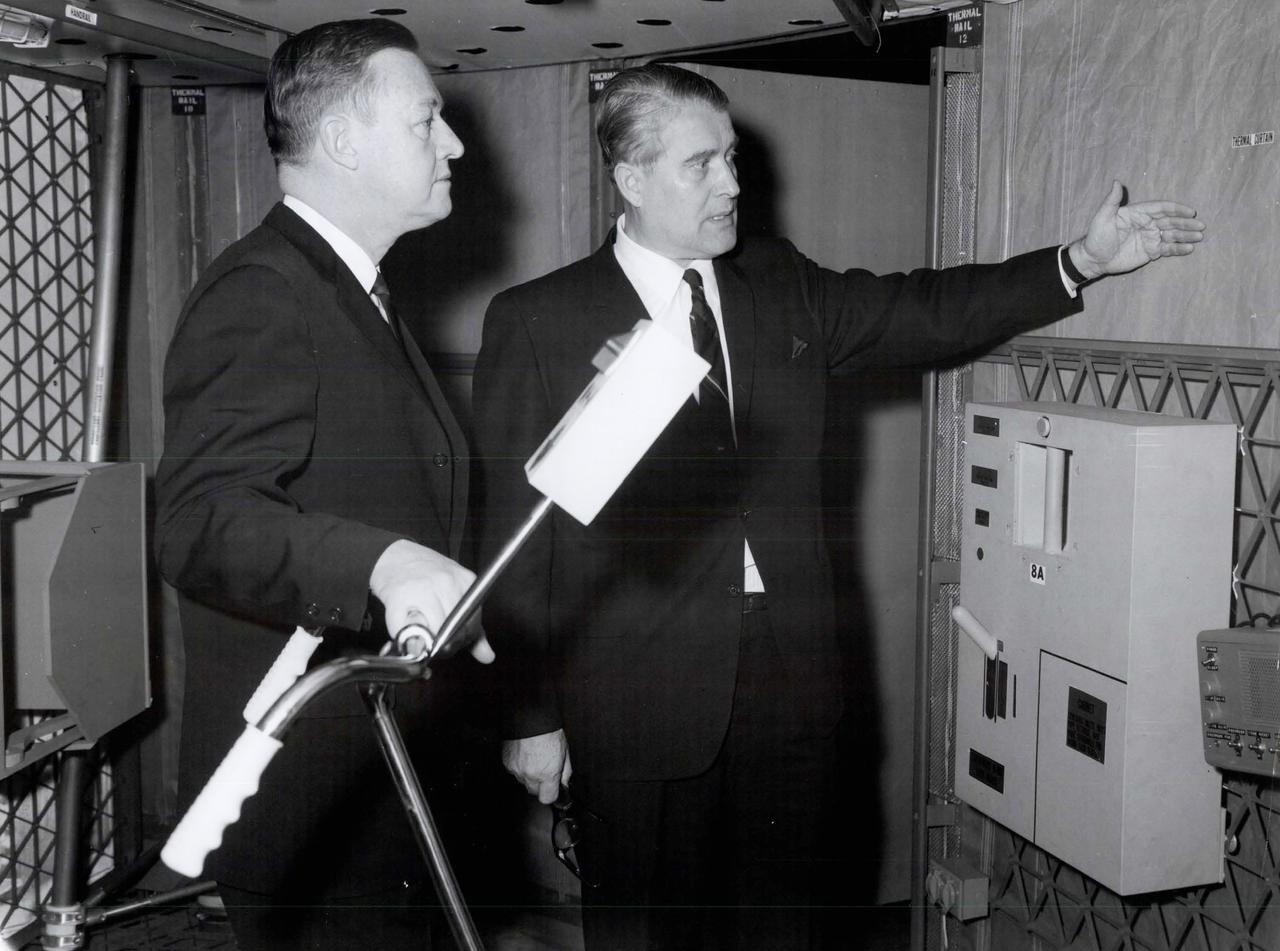 Dr. Wernher von Braun, Director of the Marshall Space Flight Center, explains the purpose of a thermal curtain in the mockup of a Saturn I workshop to U.S. Representative Armistead Seldon of Alabama. The Congressman visited the Marshall Center on March 2, 1968 to tour the workshop and to visit Marshall Center facilities.