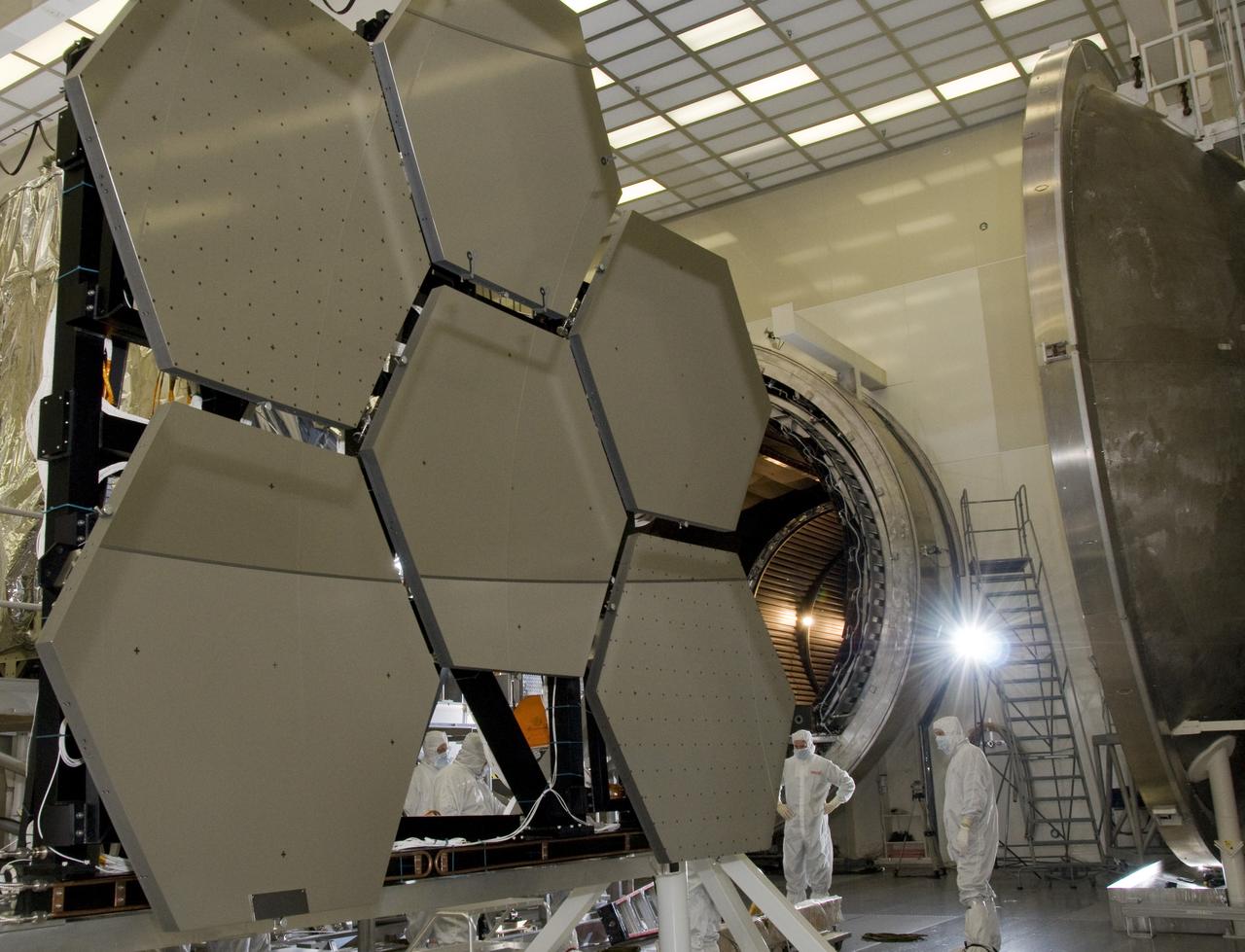 SIX OF THE EIGHTEEN JAMES WEBB SPACE TELESCOPE MIRROR SEGMENTS ARE BEING PREPPED TO MOVE INTO THE X-RAY AND CRYOGENIC FACILITY FOR TESTING.