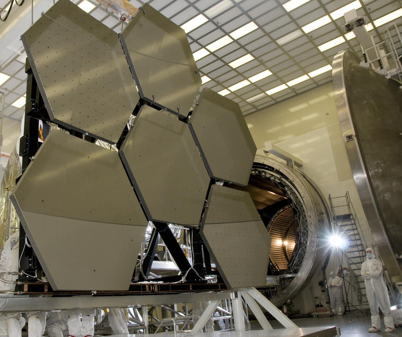 SIX OF THE EIGHTEEN JAMES WEBB SPACE TELESCOPE MIRROR SEGMENTS ARE BEING PREPPED TO MOVE INTO THE X-RAY AND CRYOGENIC FACILITY FOR TESTING.