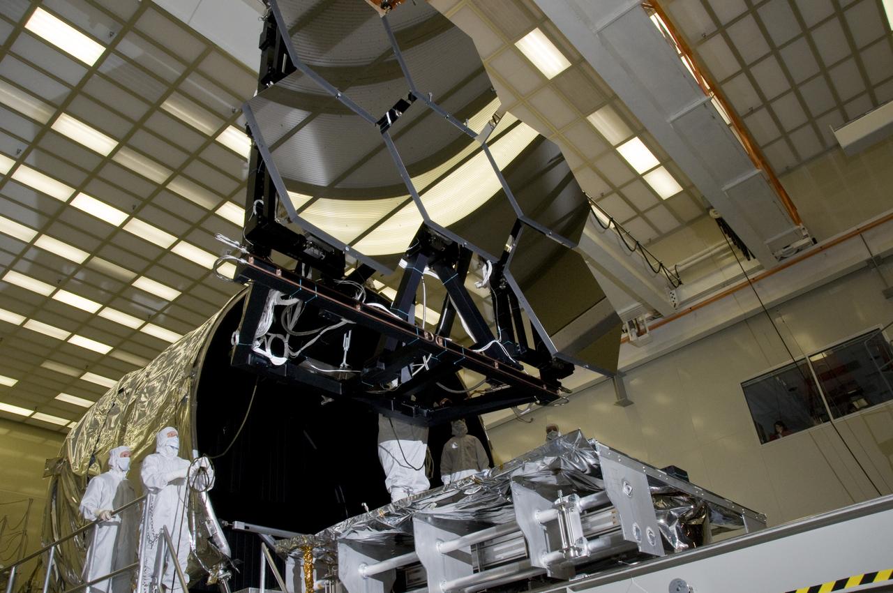 SIX OF THE EIGHTEEN JAMES WEBB SPACE TELESCOPE MIRROR SEGMENTS ARE BEING PREPPED TO MOVE INTO THE X-RAY AND CRYOGENIC FACILITY FOR TESTING.