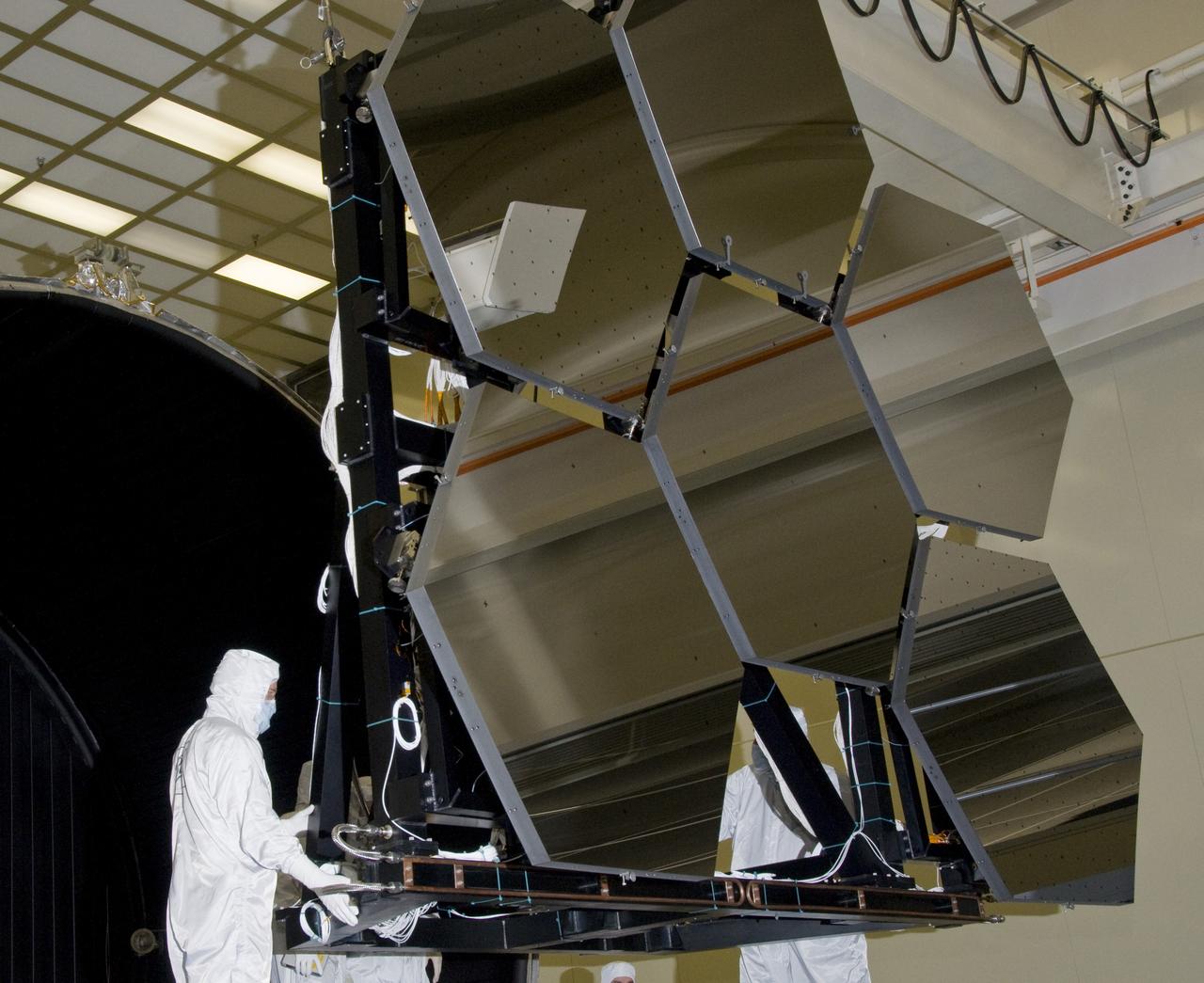 SIX OF THE EIGHTEEN JAMES WEBB SPACE TELESCOPE MIRROR SEGMENTS ARE BEING PREPPED TO MOVE INTO THE X-RAY AND CRYOGENIC FACILITY FOR TESTING.