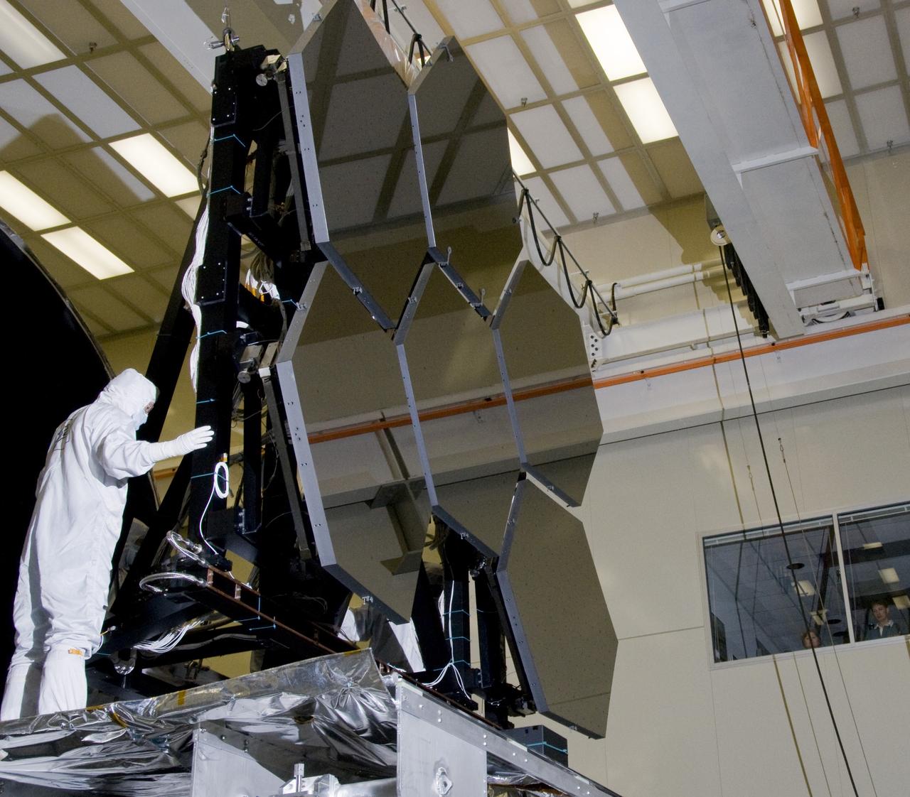 SIX OF THE EIGHTEEN JAMES WEBB SPACE TELESCOPE MIRROR SEGMENTS ARE BEING PREPPED TO MOVE INTO THE X-RAY AND CRYOGENIC FACILITY FOR TESTING.