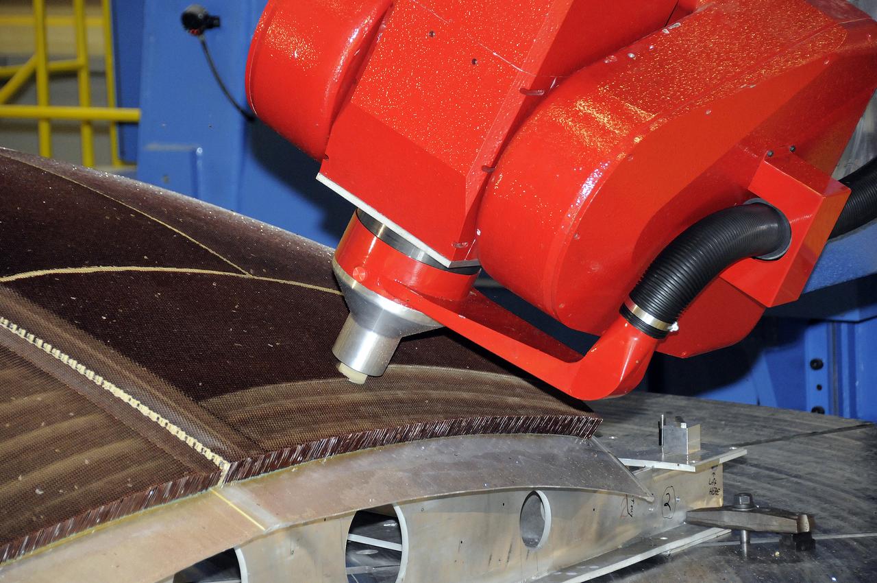 7-AXIS MILLING MACHINE PERFORMING THE ROUGH CUT ON THE 2ND QUARTER DOME DEMONSTRATION ARTICLE HONEYCOMB CORE