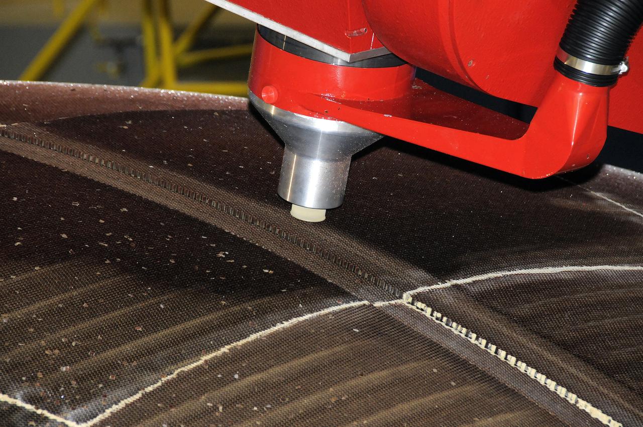 7-AXIS MILLING MACHINE PERFORMING THE ROUGH CUT ON THE 2ND QUARTER DOME DEMONSTRATION ARTICLE HONEYCOMB CORE