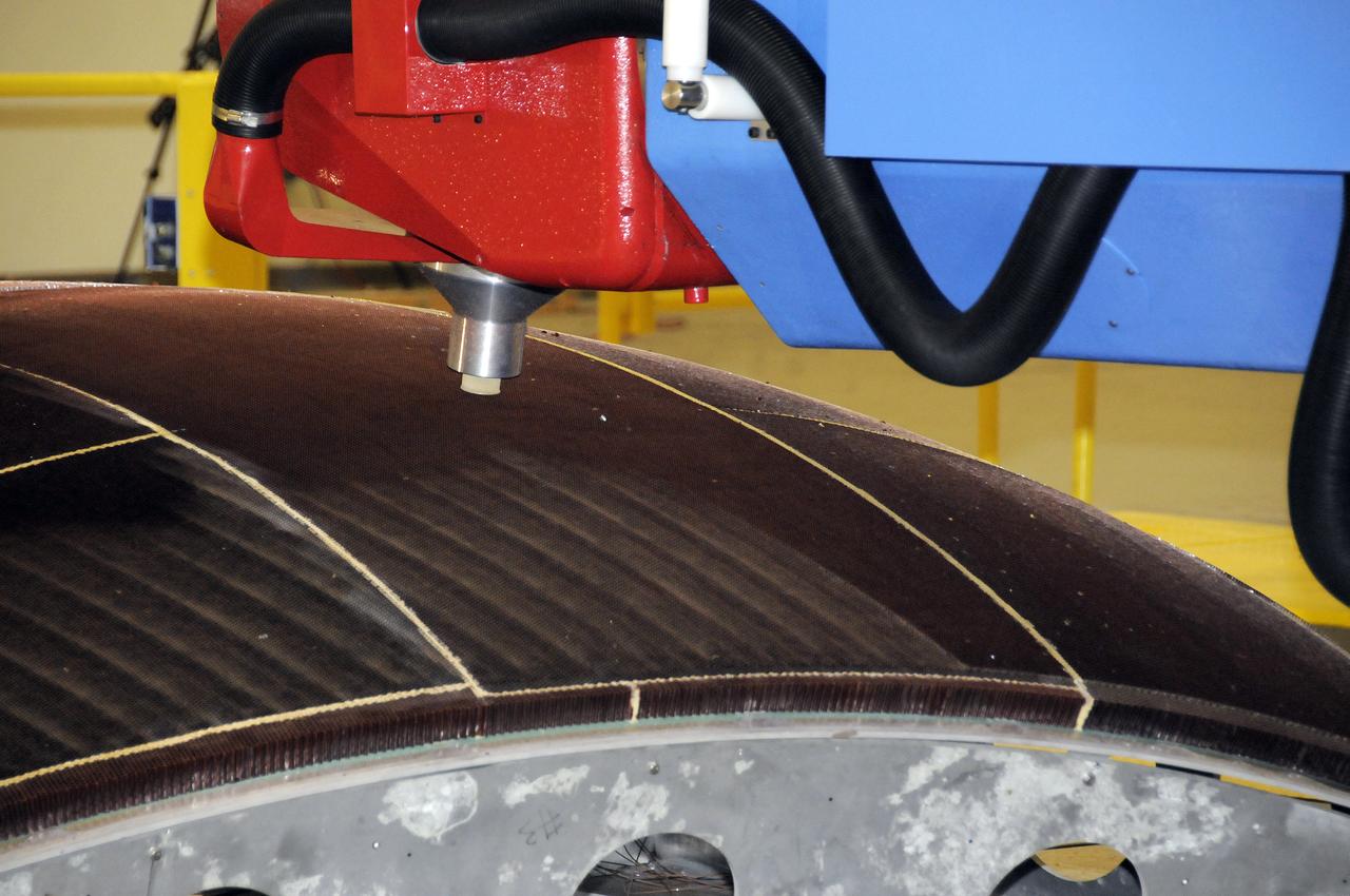 7-AXIS MILLING MACHINE PERFORMING THE ROUGH CUT ON THE 2ND QUARTER DOME DEMONSTRATION ARTICLE HONEYCOMB CORE
