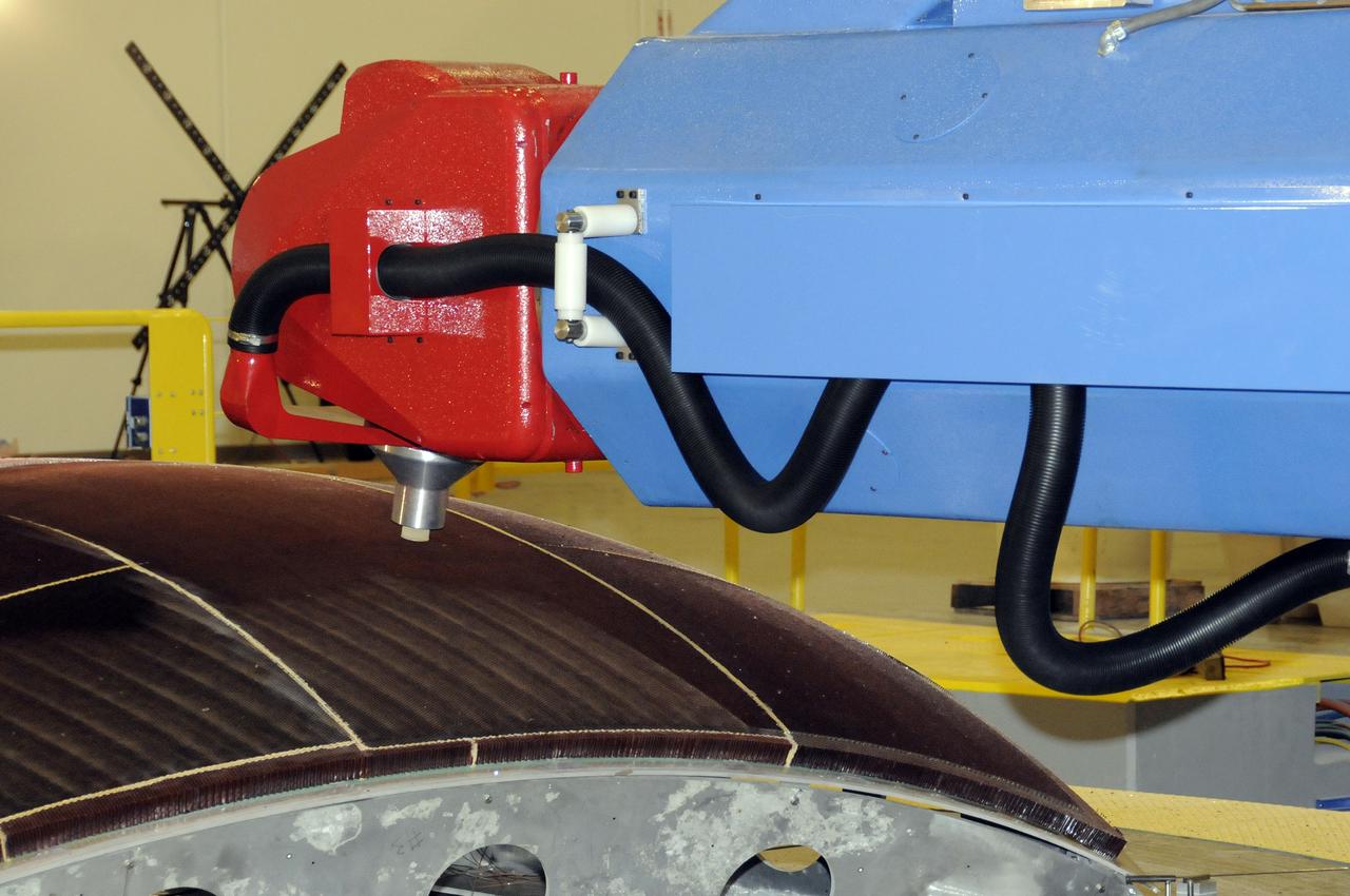 7-AXIS MILLING MACHINE PERFORMING THE ROUGH CUT ON THE 2ND QUARTER DOME DEMONSTRATION ARTICLE HONEYCOMB CORE