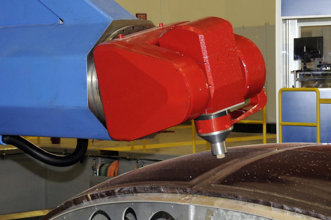 7-AXIS MILLING MACHINE PERFORMING THE ROUGH CUT ON THE 2ND QUARTER DOME DEMONSTRATION ARTICLE HONEYCOMB CORE