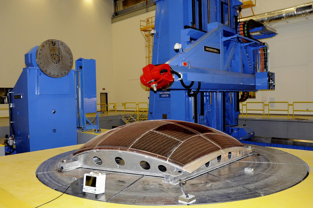 7-AXIS MILLING MACHINE PERFORMING THE ROUGH CUT ON THE 2ND QUARTER DOME DEMONSTRATION ARTICLE HONEYCOMB CORE