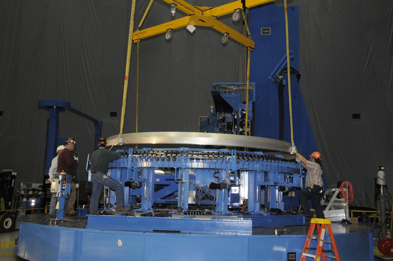 ARES HARDWARE MOVE IN BUILDING 4755 OF A Y-RING INTO THE ROBOTIC WELD TOOL & THE COMMON BULKHEAD DOME MANUFACTURING DEMONSTRATION ARTICLE ONTO THE WOODEN TOOLING STANDS ON FEBRUARY 19, 2010
