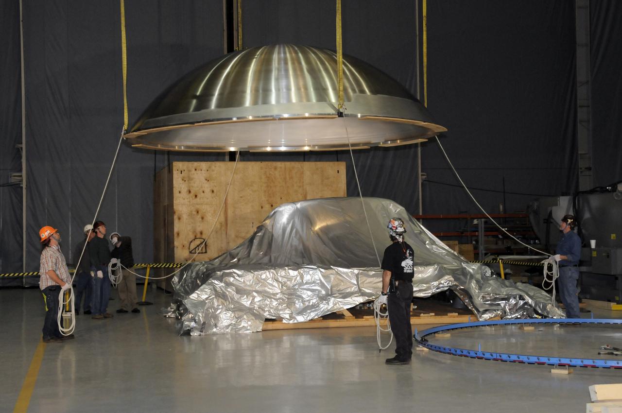 ARES HARDWARE MOVE IN BUILDING 4755 OF A Y-RING INTO THE ROBOTIC WELD TOOL & THE COMMON BULKHEAD DOME MANUFACTURING DEMONSTRATION ARTICLE ONTO THE WOODEN TOOLING STANDS ON FEBRUARY 19, 2010