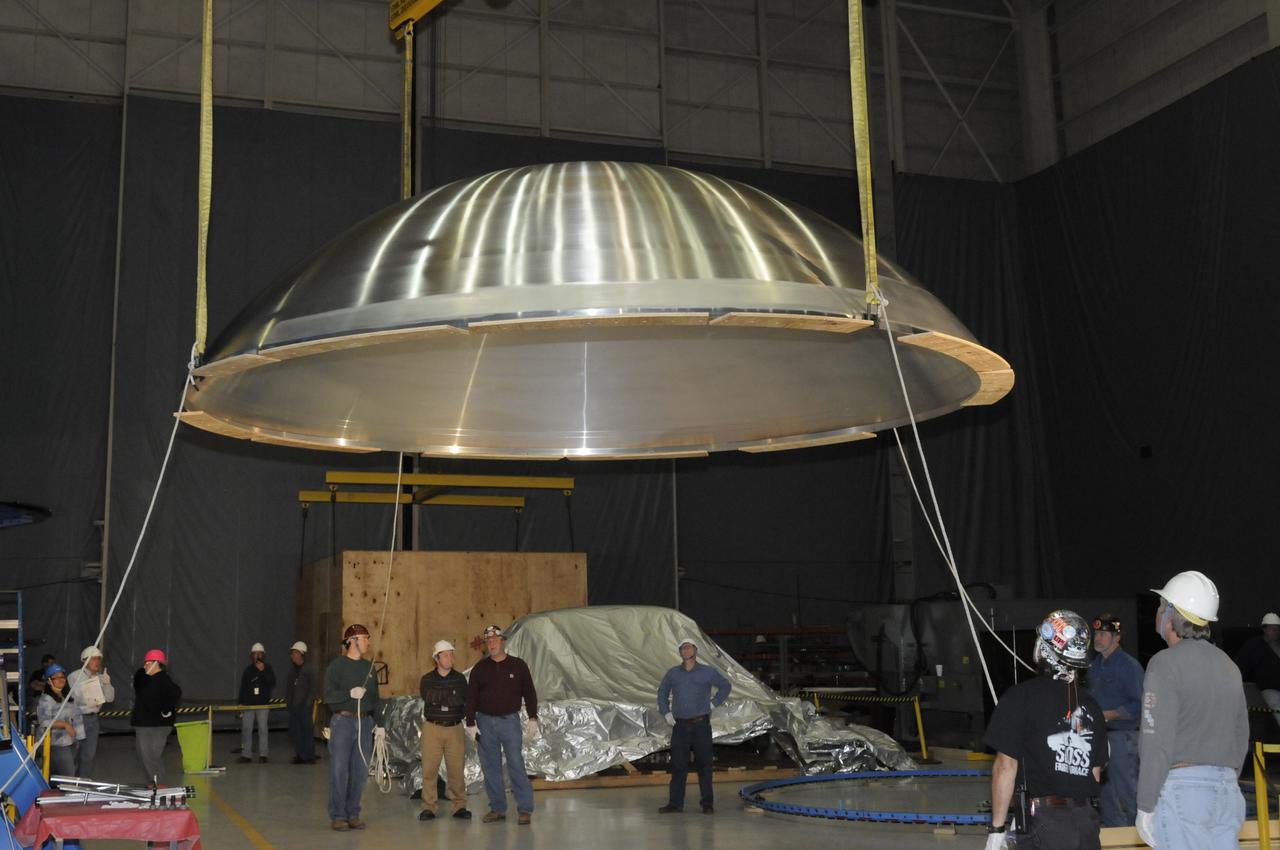 ARES HARDWARE MOVE IN BUILDING 4755 OF A Y-RING INTO THE ROBOTIC WELD TOOL & THE COMMON BULKHEAD DOME MANUFACTURING DEMONSTRATION ARTICLE ONTO THE WOODEN TOOLING STANDS ON FEBRUARY 19, 2010