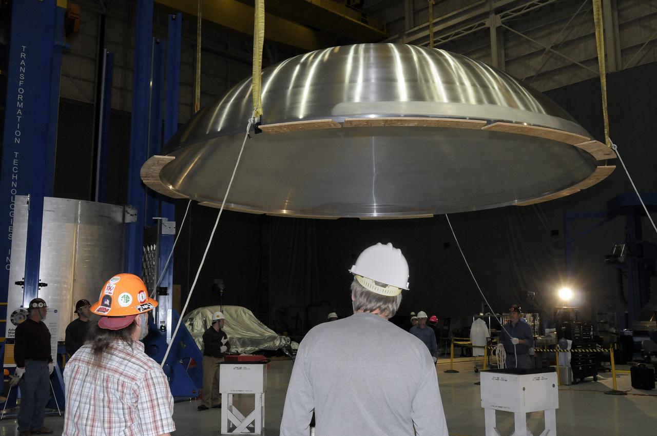 ARES HARDWARE MOVE IN BUILDING 4755 OF A Y-RING INTO THE ROBOTIC WELD TOOL & THE COMMON BULKHEAD DOME MANUFACTURING DEMONSTRATION ARTICLE ONTO THE WOODEN TOOLING STANDS ON FEBRUARY 19, 2010