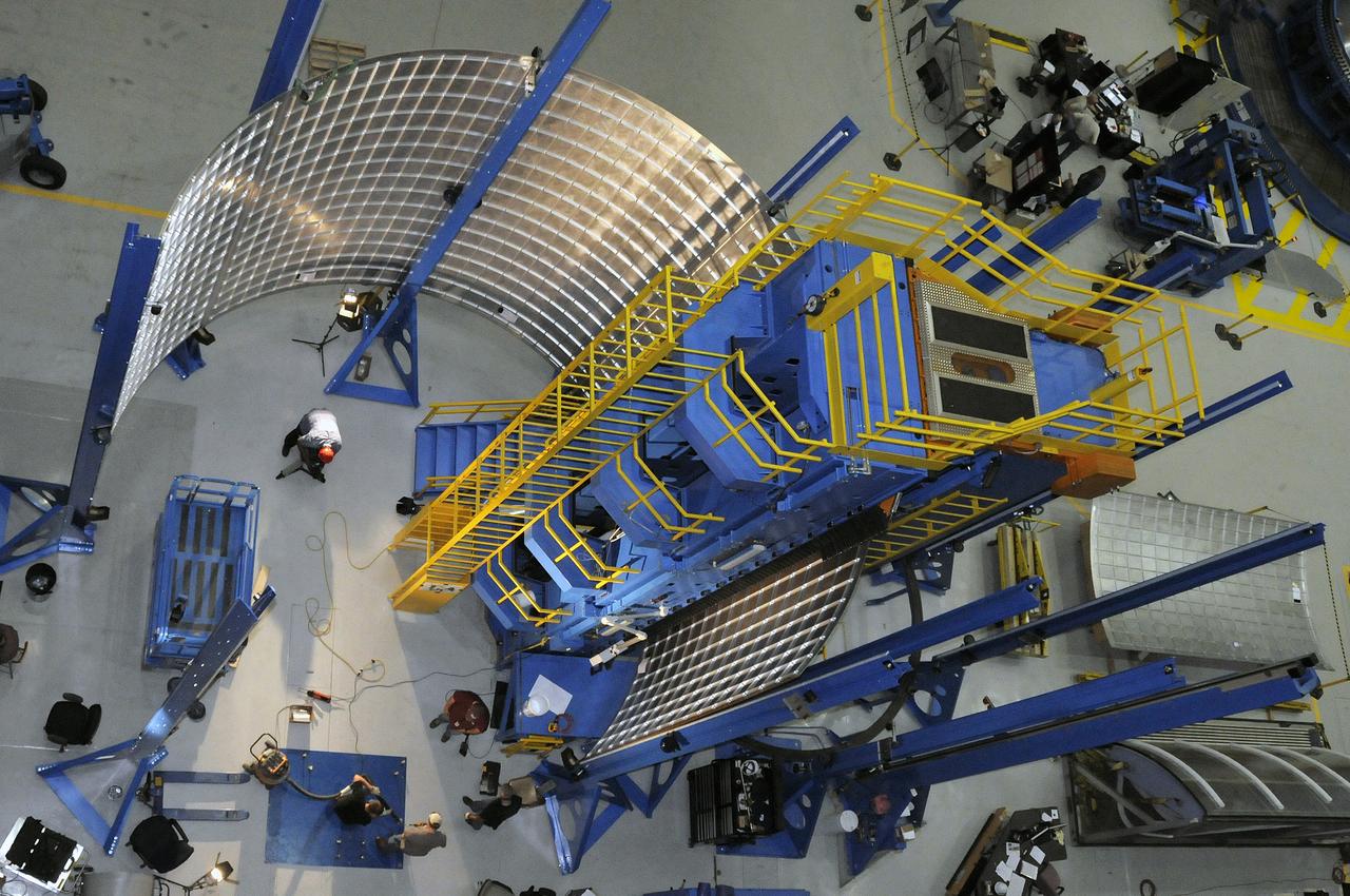 FIVE SEGMENTS LOADED ONTO THE VERTICAL WELD TOOL FOR SHELL BUCKLING TEST IN BUILDING 4755
