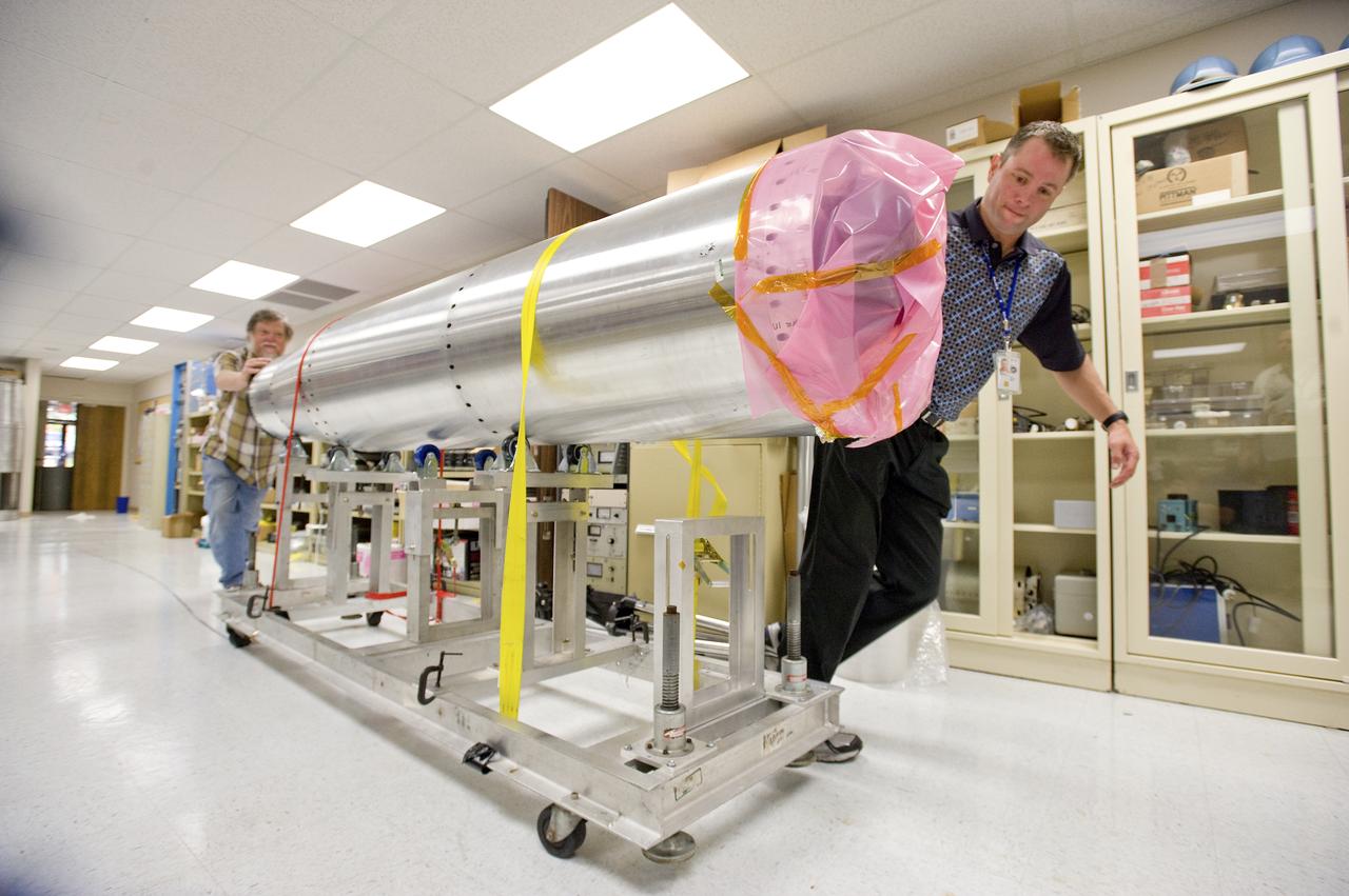  DR. JONATHAN CIRTAIN AND ED WEST PUSH SUMI OUT OF THE LAB AND TOWARD THE LOADING DOCK.  SUMI SHIPPED TO WHITE SANDS MISSILE RANGE ON MAY 14, 2010.  