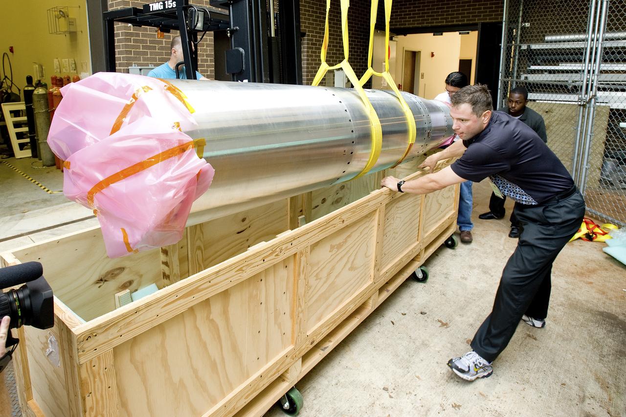 DR. JONATHAN CIRTAIN WATCHES AS SUMI IS LOADED INTO ITS SHIPPING CRATE FOR DELIVERY TO WHITE SAND MISSILE RANGE.  SUMI IS TARGETED FOR LAUNCH JUNE 8, 2010