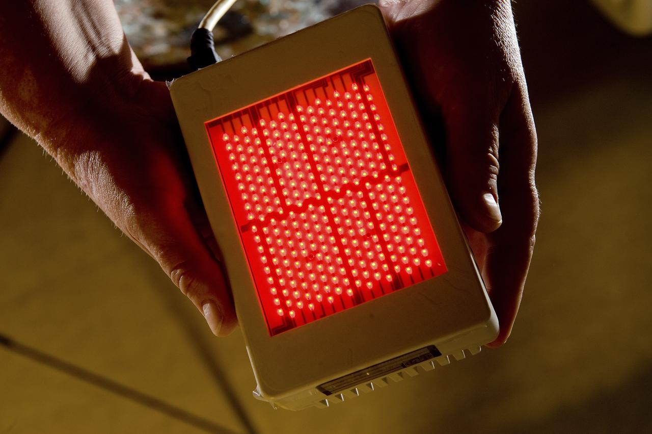 THE HAND HELD DEVICE USED FOR OF LED TREATMENT TO HELP REDUCE RECOVERY TIME FROM CANCER TREATMENT RELATED ORAL SORES