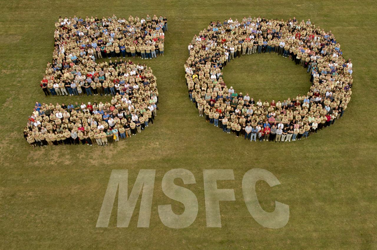 1129 MARSHALL EMPLOYEES FORM THE SHAPE OF THE NUMBERS “5” AND “0” DURING MARSHALL SPACE FLIGHT CENTER’S 50TH ANNIVERSARY EVENT.  
